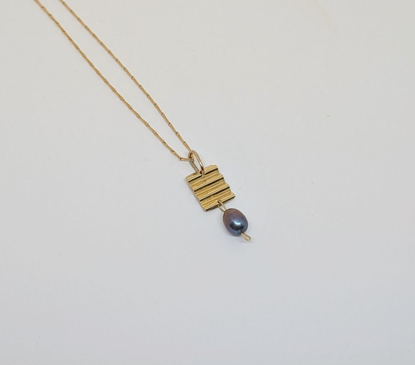 Gold pendant
