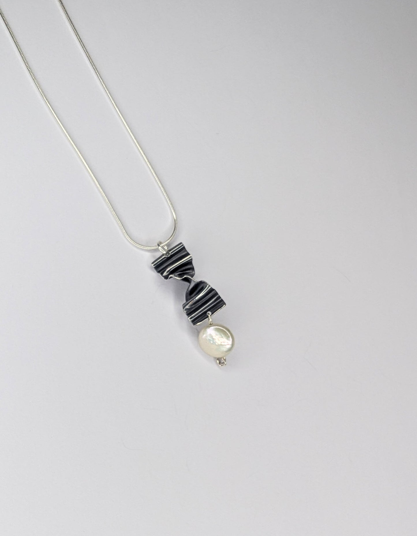 White pearl pendant
