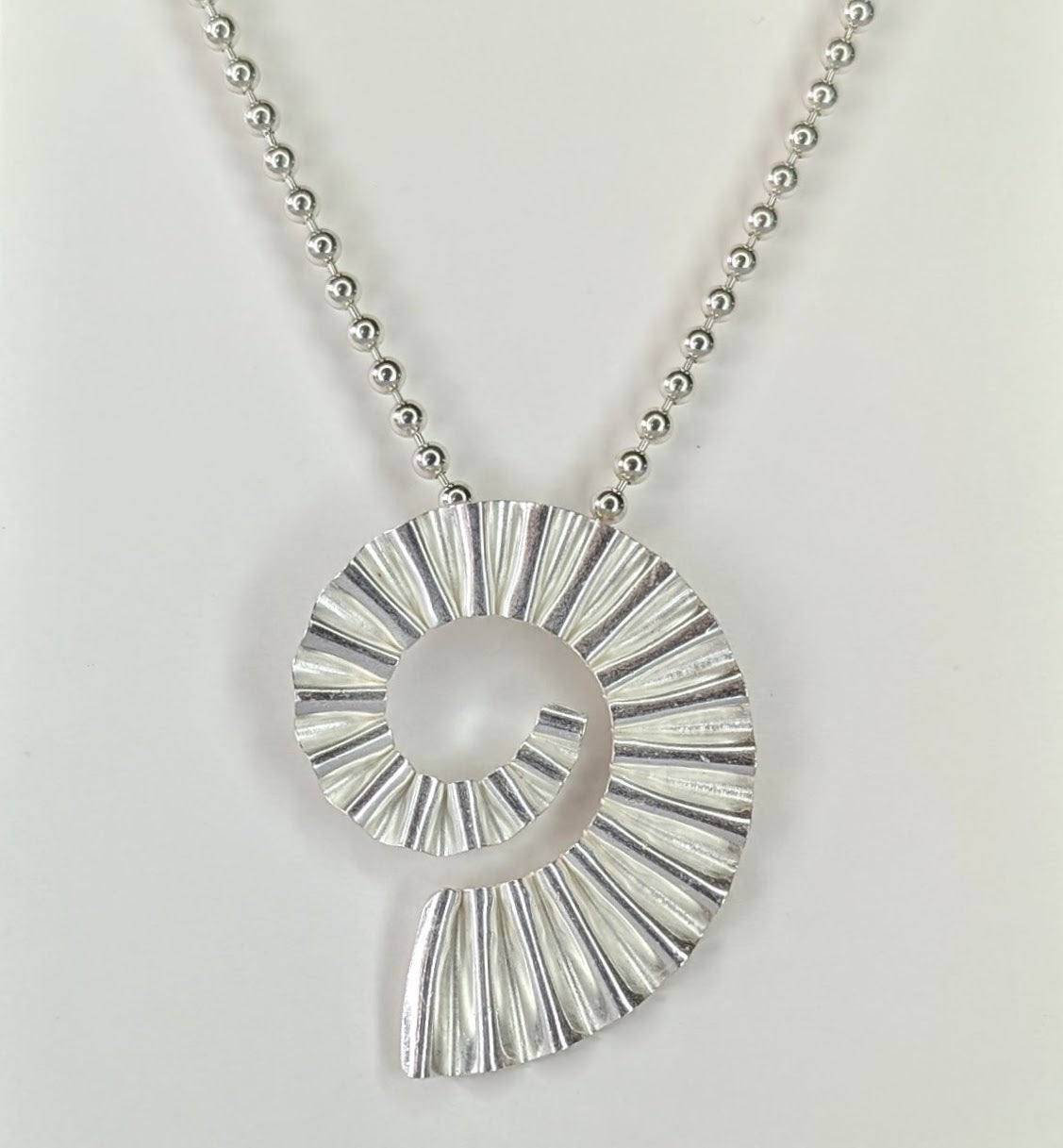 Silver ammonite fossil jewellery