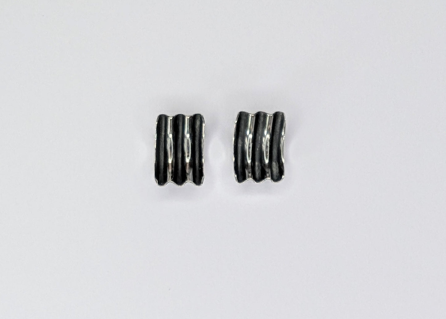 Sea ripple curl silver earrings
