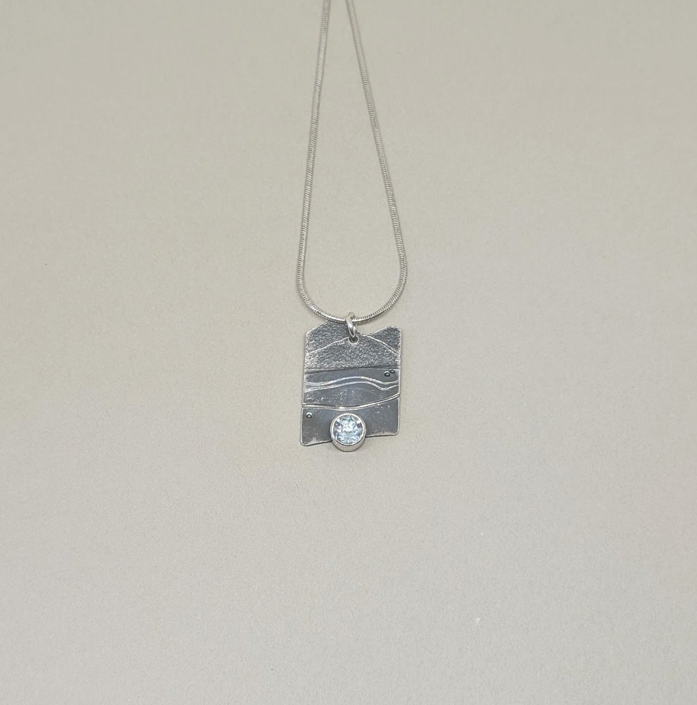 Happy Place pendant with blue topaz