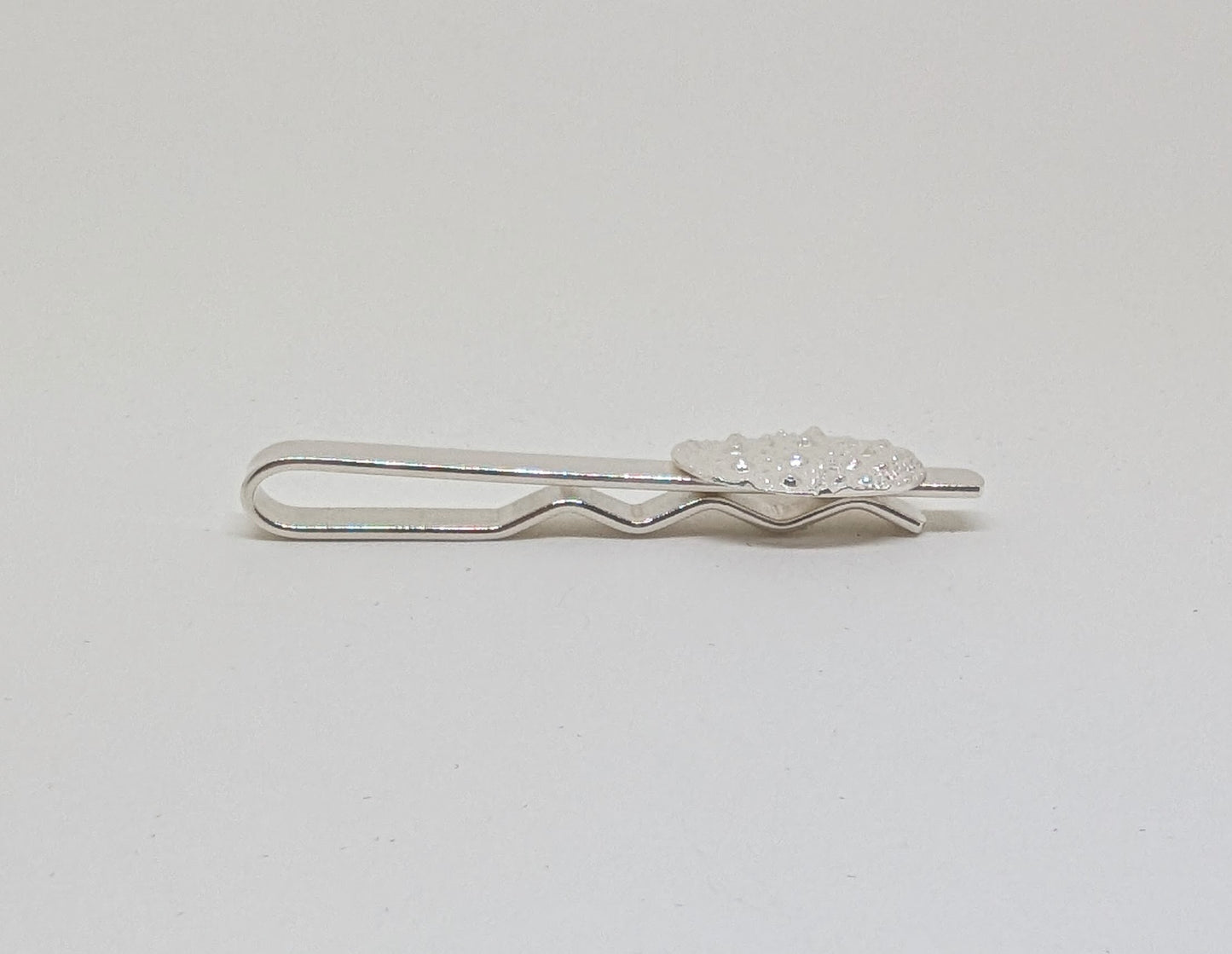 Tie slide