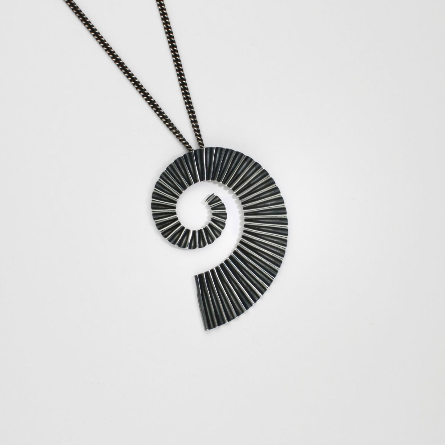 Statement ammonite shell inspired jewellery