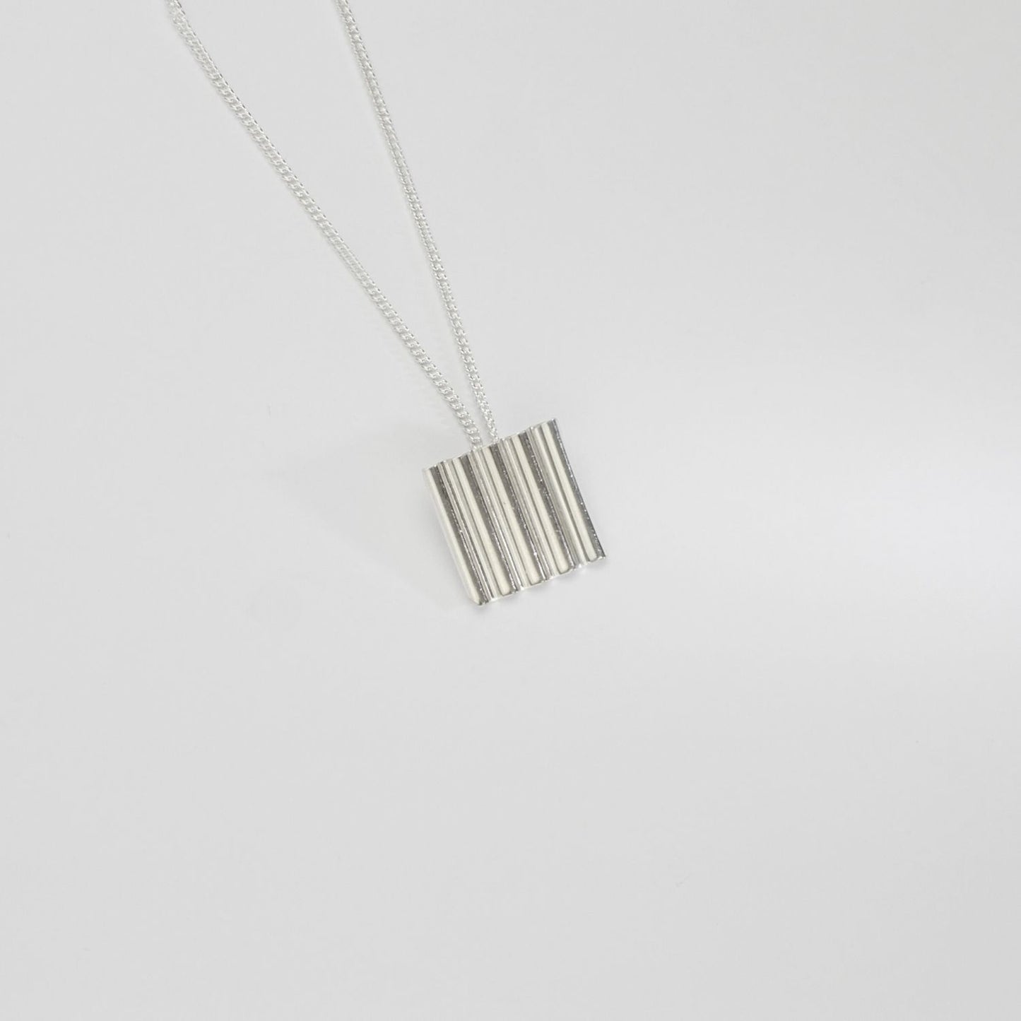 Square silver pendant