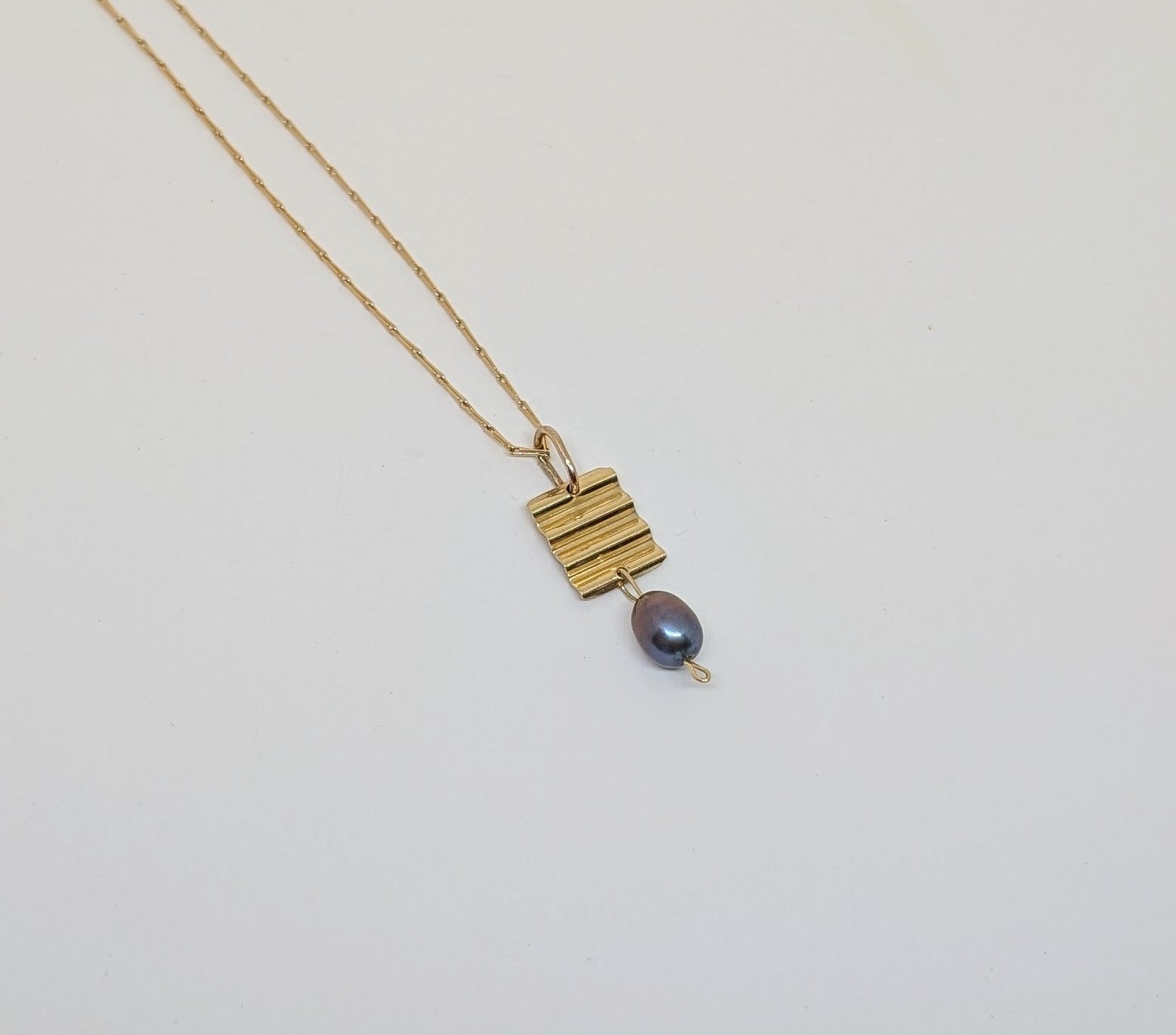 Gold pendant