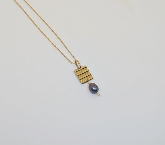 Gold pendant