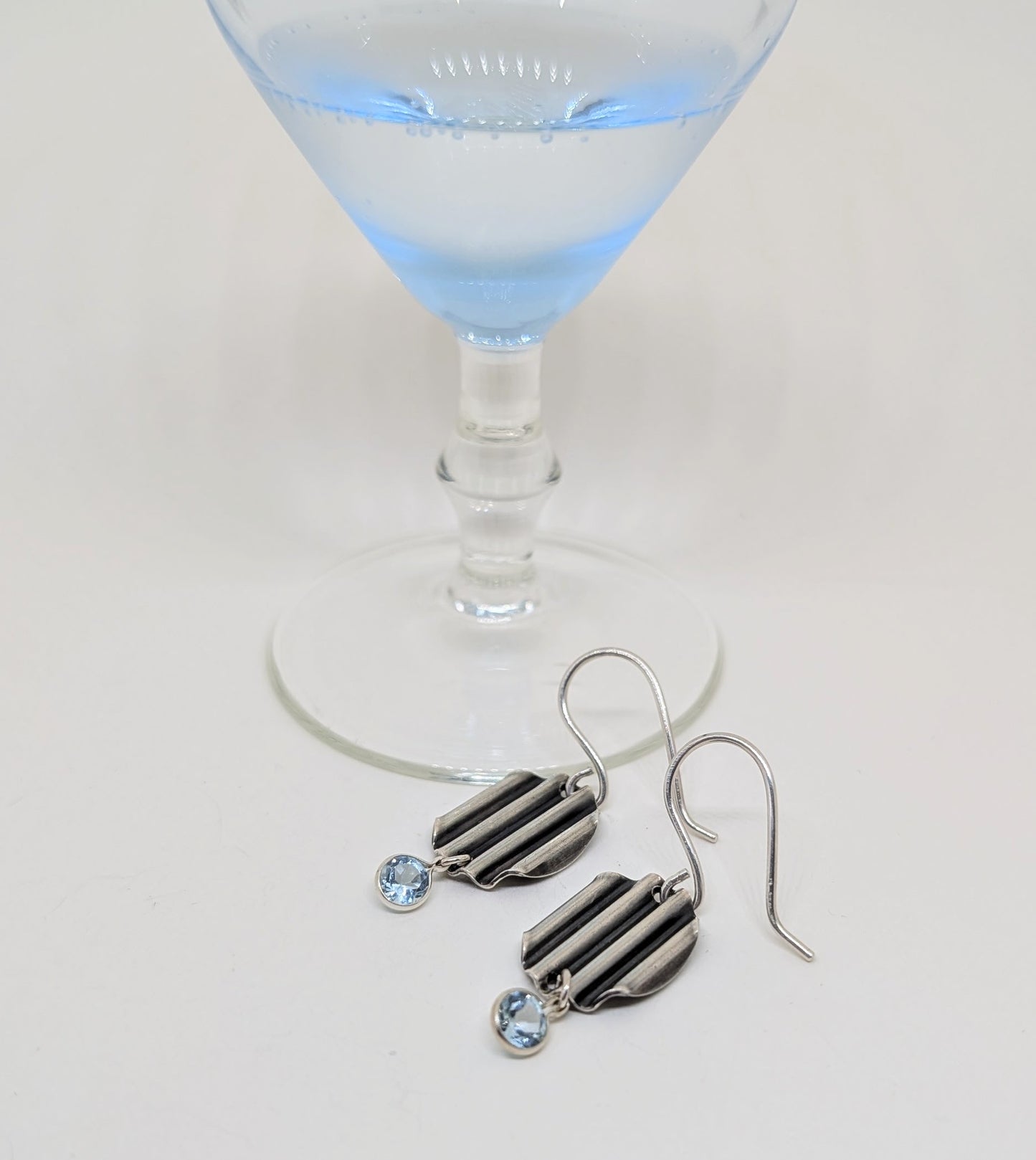 Earrings with blue topaz