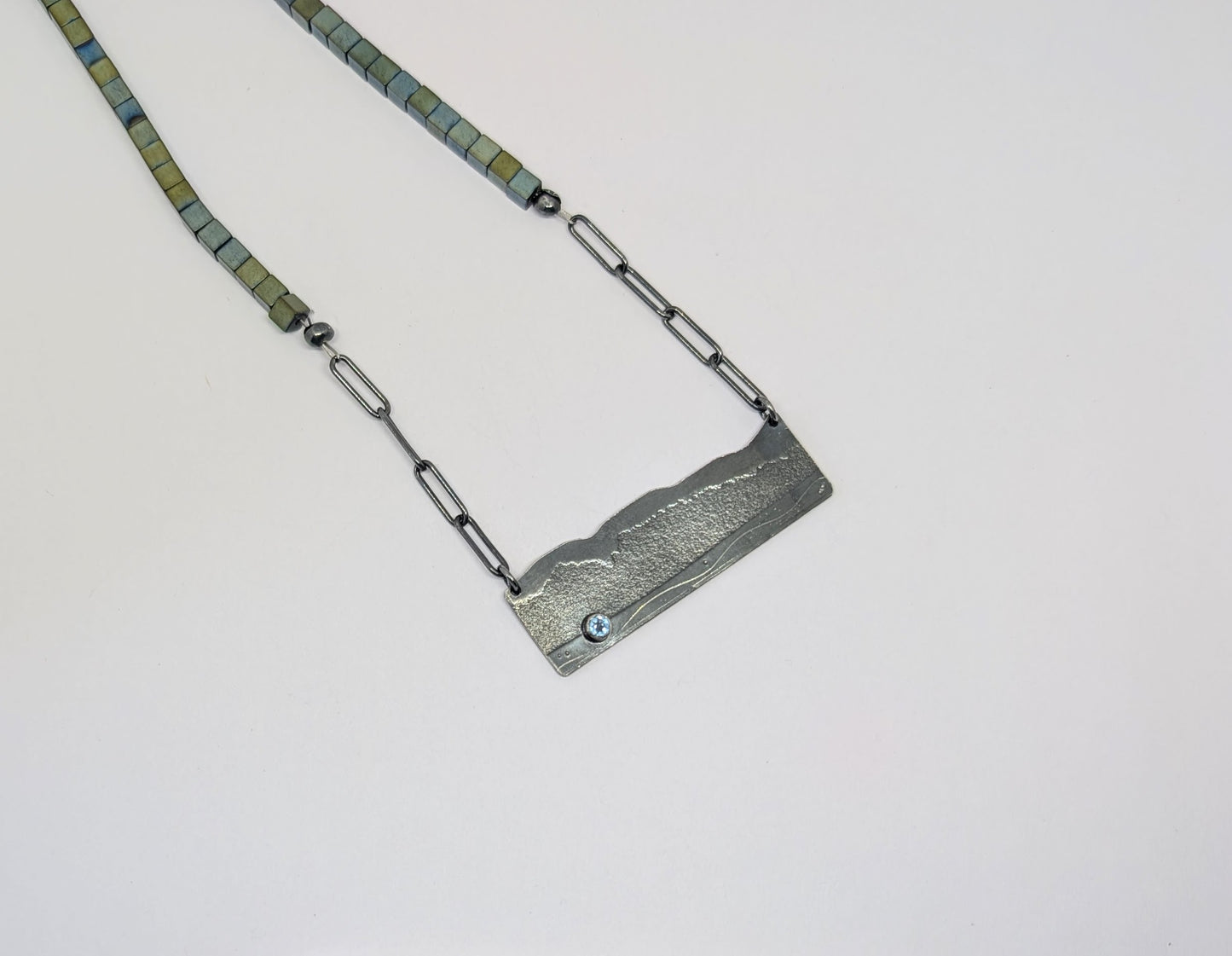 Happy Place necklace with blue topaz and haematite