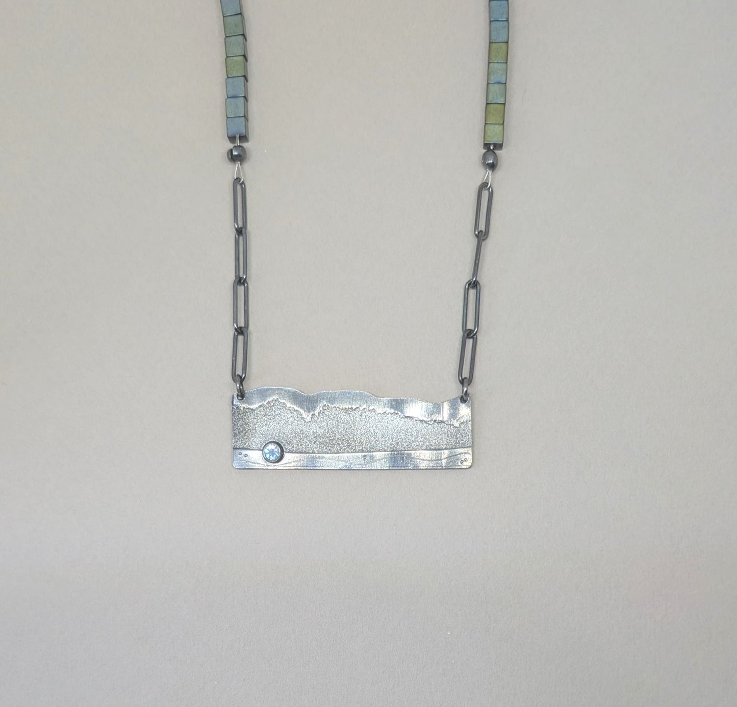 Happy Place necklace with blue topaz and haematite