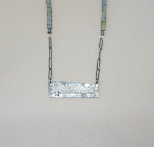 Happy Place necklace with blue topaz and haematite