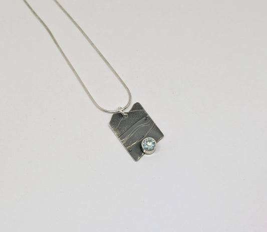 Happy Place pendant with blue topaz