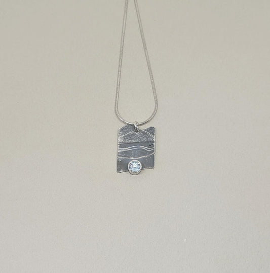Happy Place pendant with blue topaz