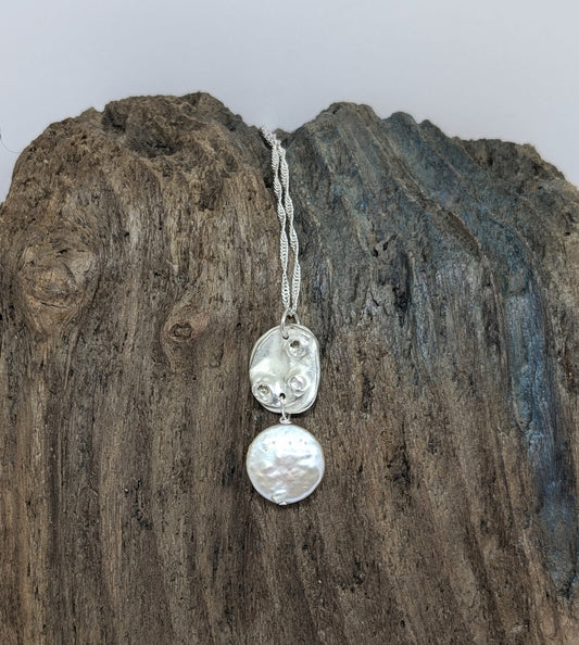 Reversible silver splash pendant with coin pearl